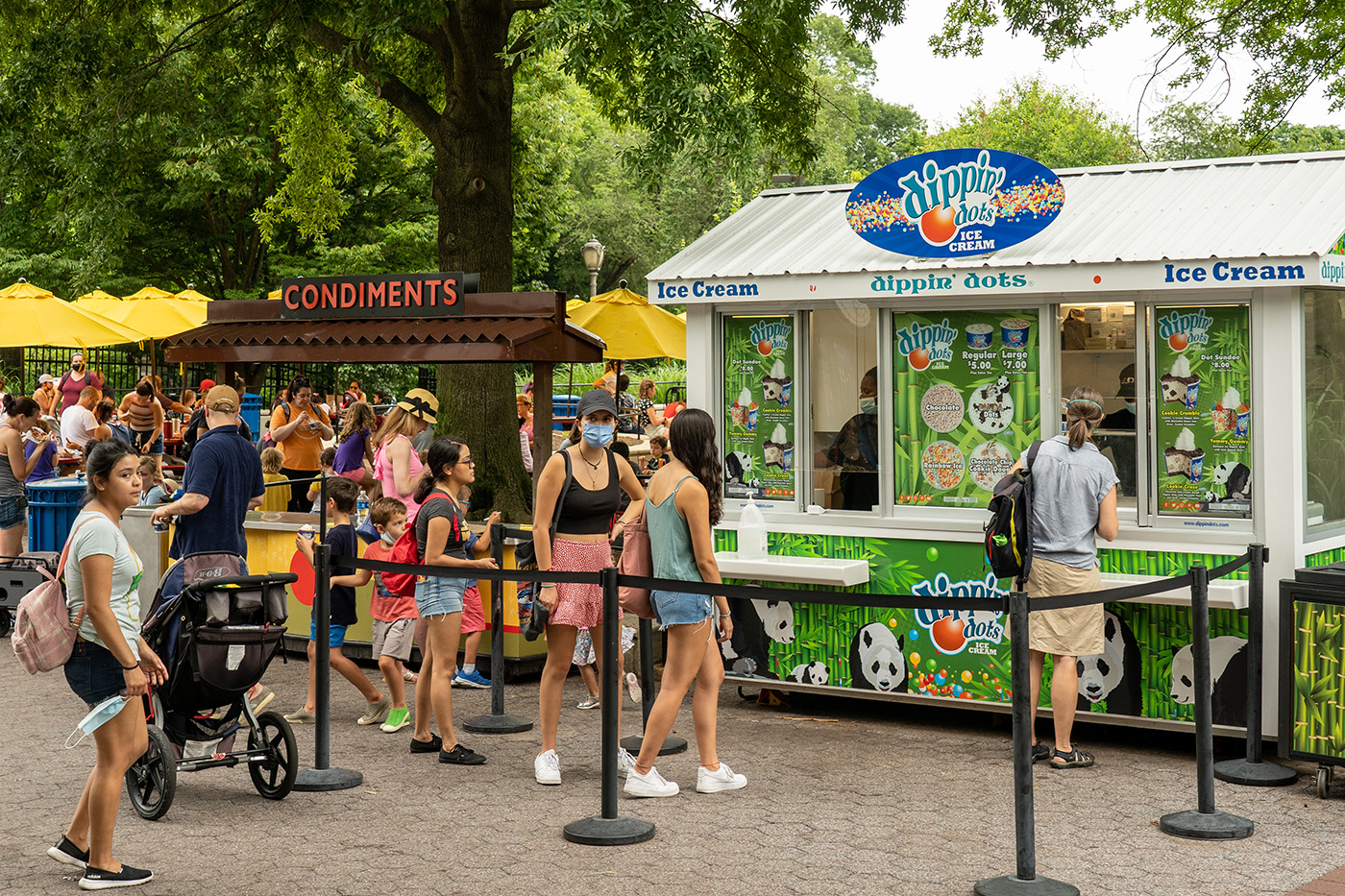 Visitors waiting to order at the Dippin Dots ice cream stand