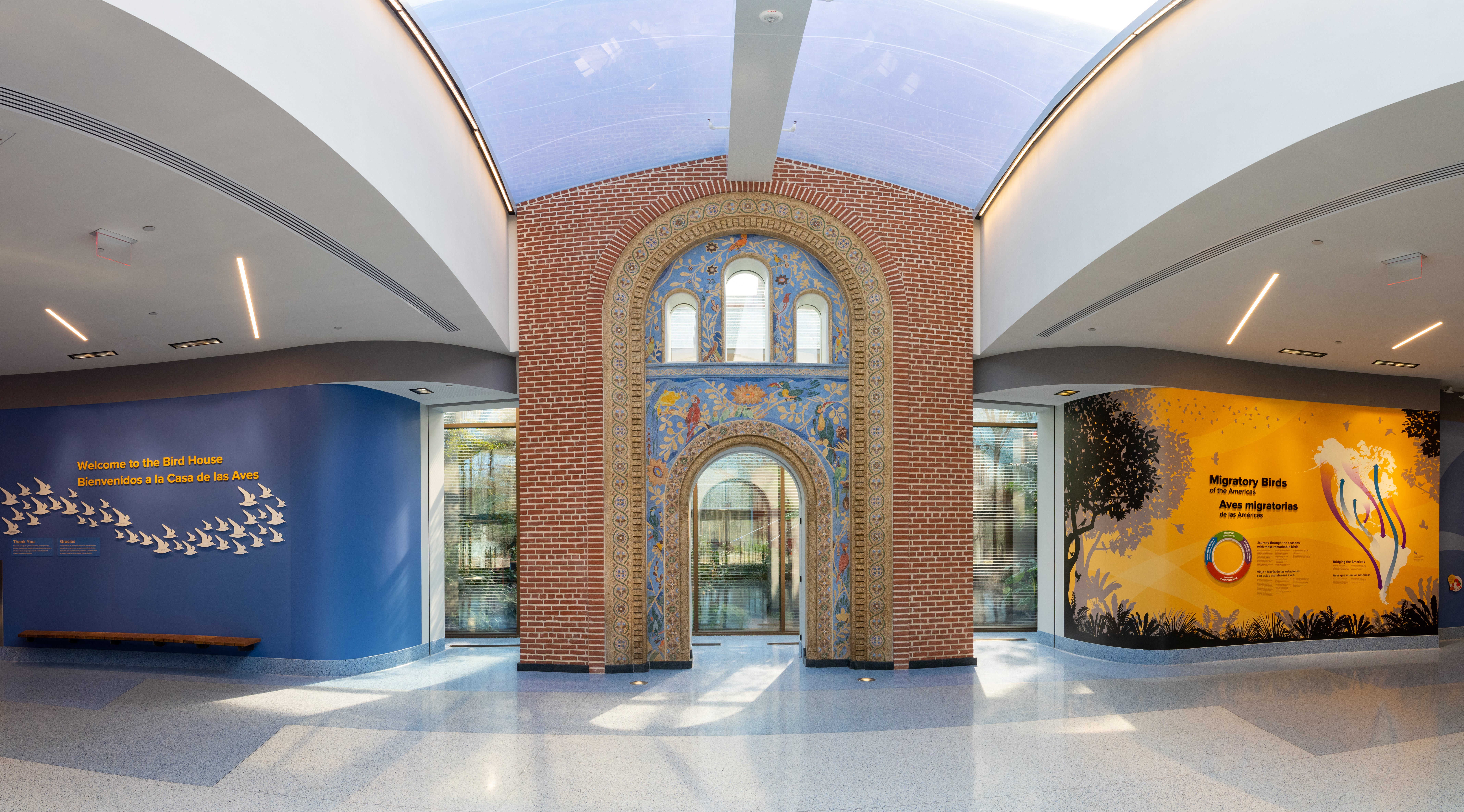 Upon entering the Bird House, visitors will observe a towering mosaic arch decorated with parrots, toucans, songbirds and other tropical species. This artwork was originally part of the 1928 front entrance to the Bird House. Designed and fabricated by loc