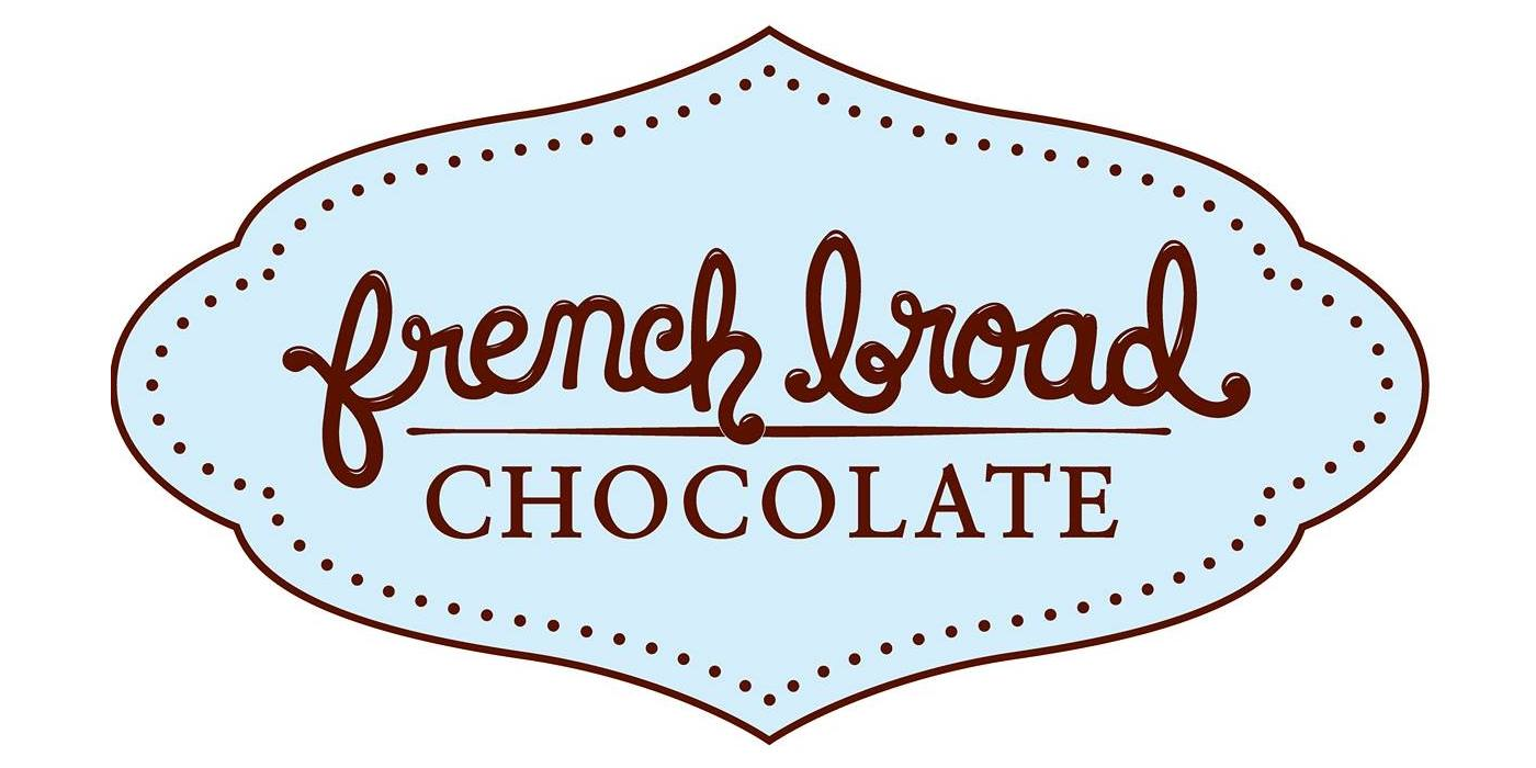 The logo for "french broad" chocolate. Text in script and serif font on a blue background with a swirvy oval shape framing it