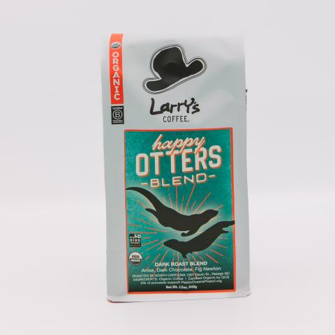 a coffee bag with an illustration of two swimming otters
