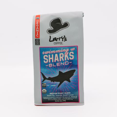 a coffee bag with an illustration of a shark