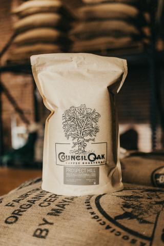 a coffee bag with an illustration of an oak tree