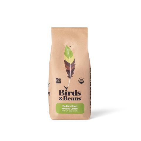 a coffee bag with a graphic illustration of a bird feather