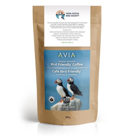 a coffee bag with a picture of two puffins perching on a rock