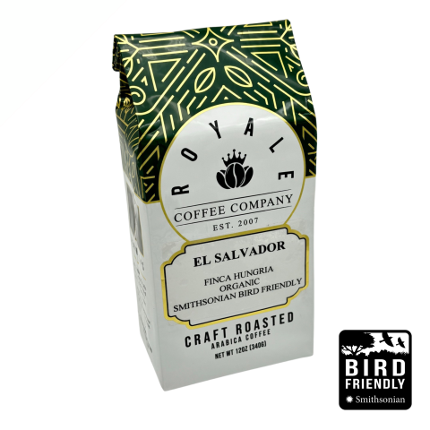a coffee bag with an illustration of coffee beans wearing a crown