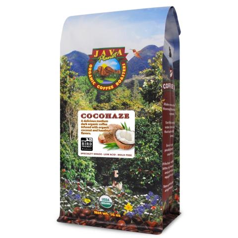 a coffee bag with an image of a rainforest and mountains