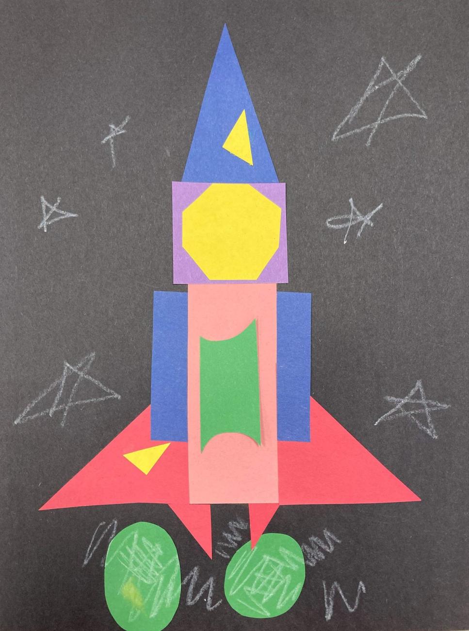 Colorful rocket made out of construction paper shapes