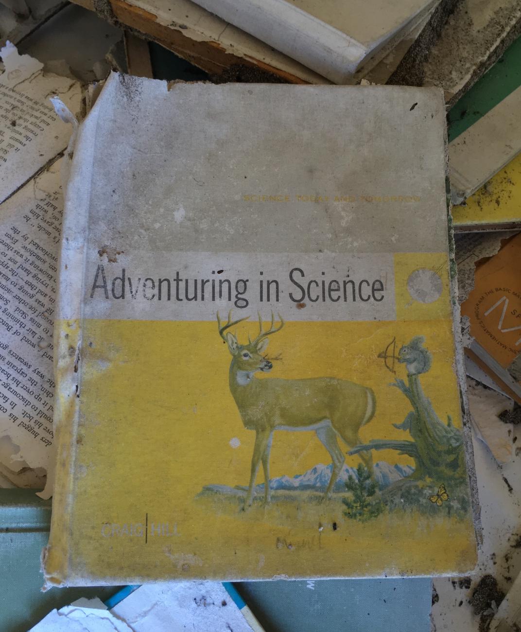 Tattered book titled "Adventuring in Science" with illustration of a squirrel pointing a bow and arrow at a deer