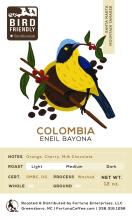 a coffee label with an illustration of a Mountain Tanager perched on a branch holding a coffee branch in its beak and surrounded by a coffee mug and coffee beans