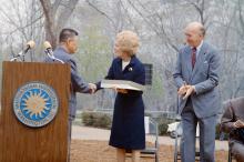 First Lady Patricia Nixon receives a gift at the Zoo April 20, 1972, for the official welcome ceremony for giant pandas Ling Ling and Hsing Hsing