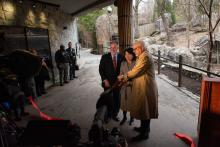 Director Steven Monfort, Minister Xu Xueyuan (Embassy of the People's Republic of China) and David Rubenstein cut a red ribbon during the Smithsonian's National Zoo's Giant Panda Housewarming Celebration