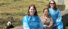 The Zoo's panda keepers pose with panda keepers in China