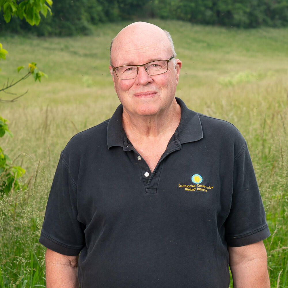 Ecologist wearing a black polo