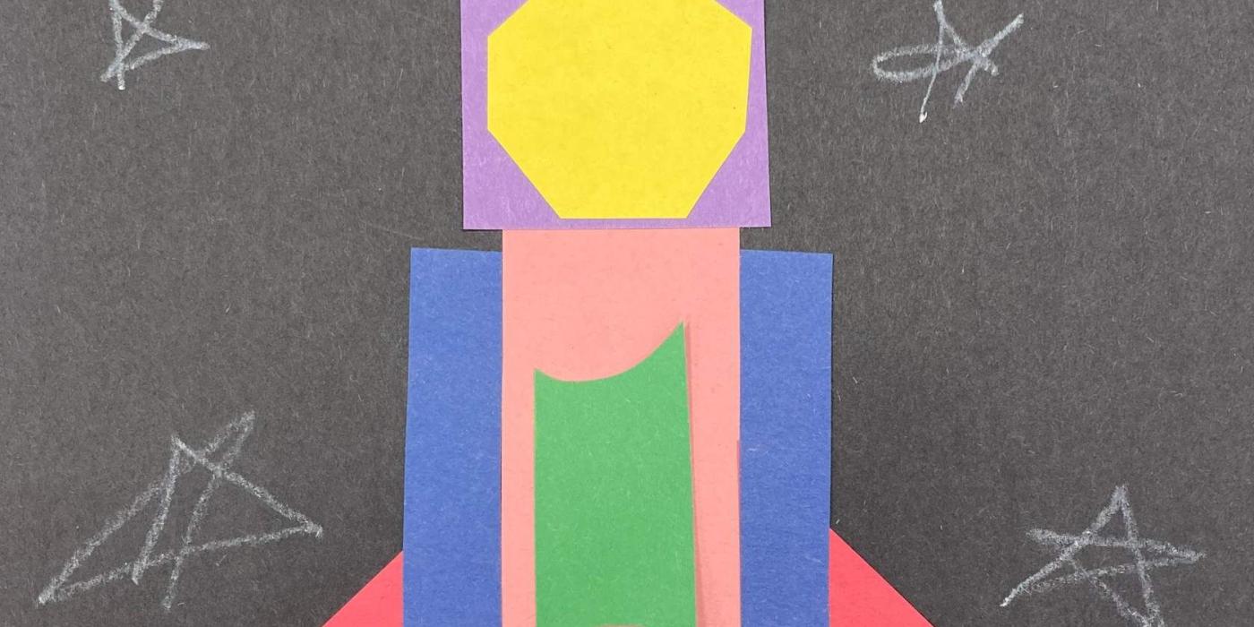 Colorful rocket made out of construction paper shapes