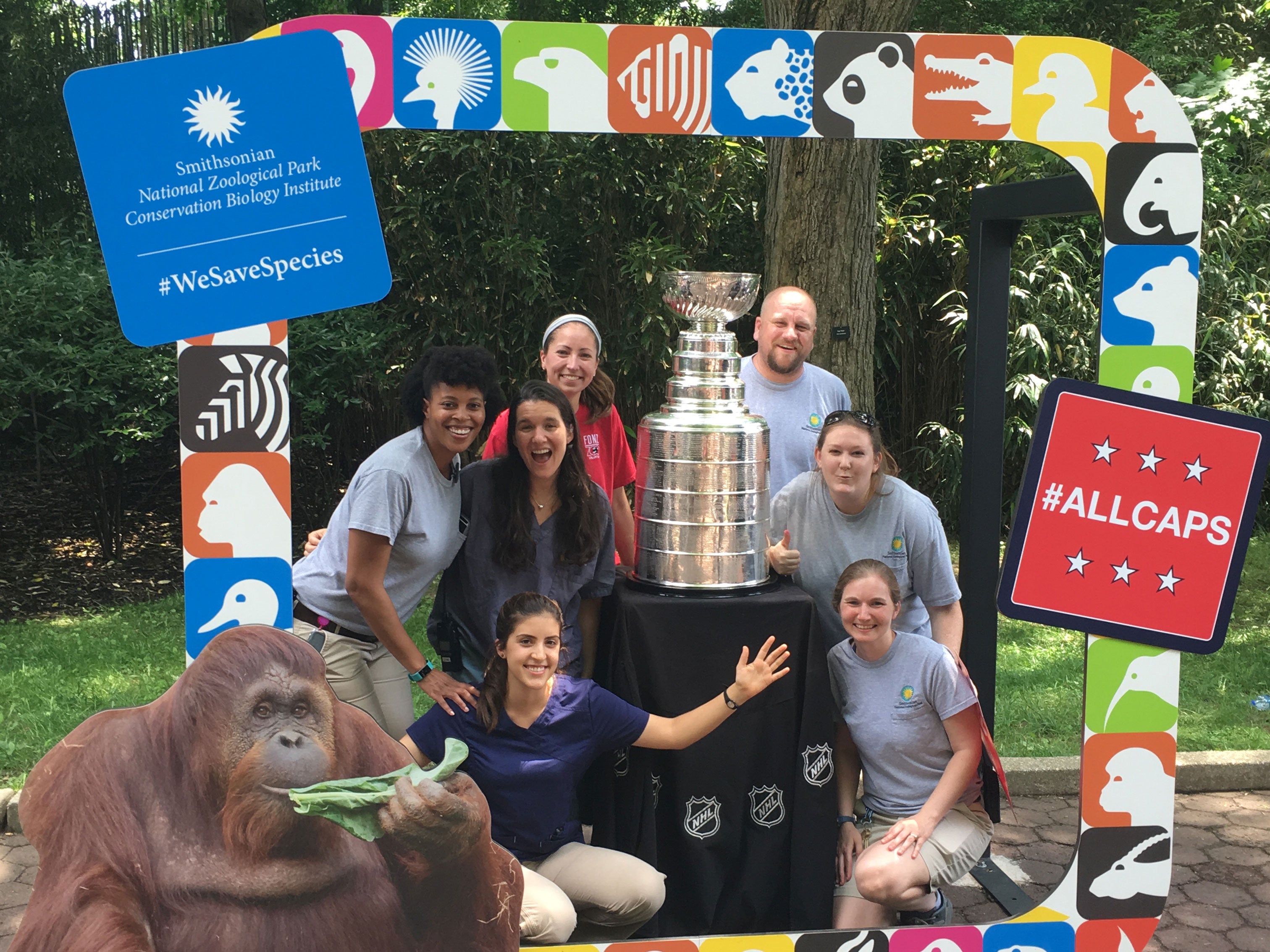 A group of Smithsonian's National Zoo veterinarians pose with the Stanley Cup